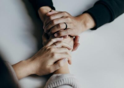 hands holding comforting support