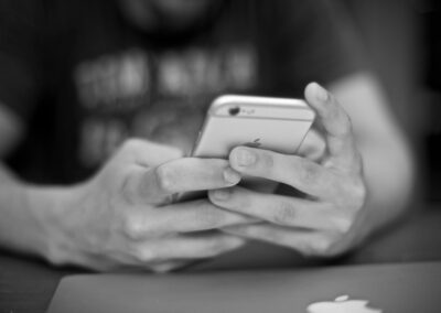 man using iphone