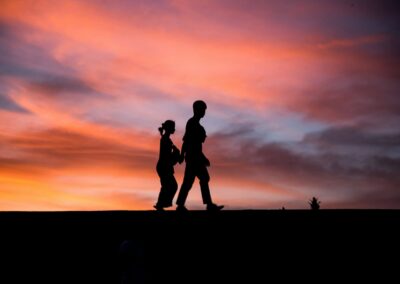 Couple walking in the sunset