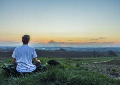 man meditating in nature