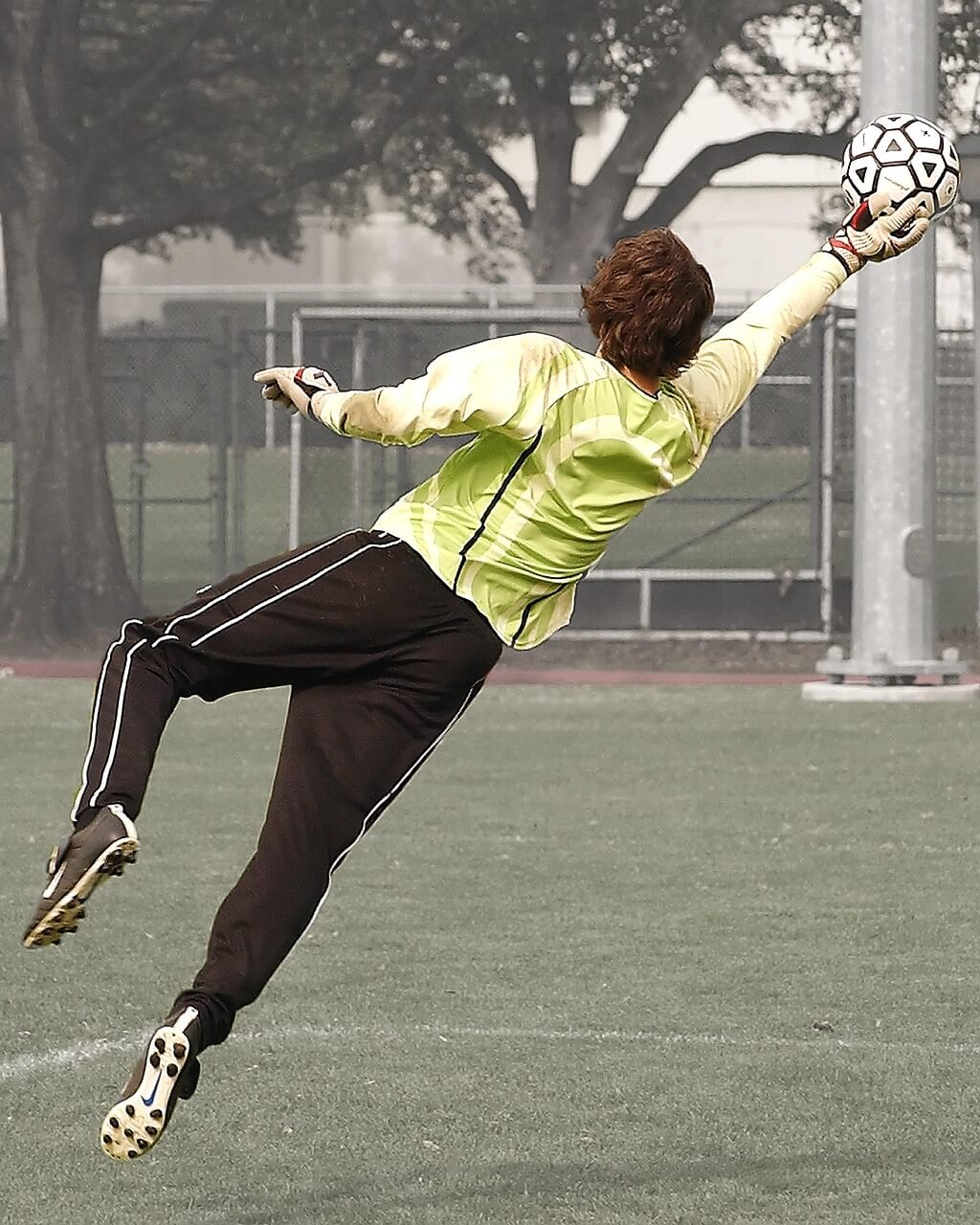 soccer goalie saving ball