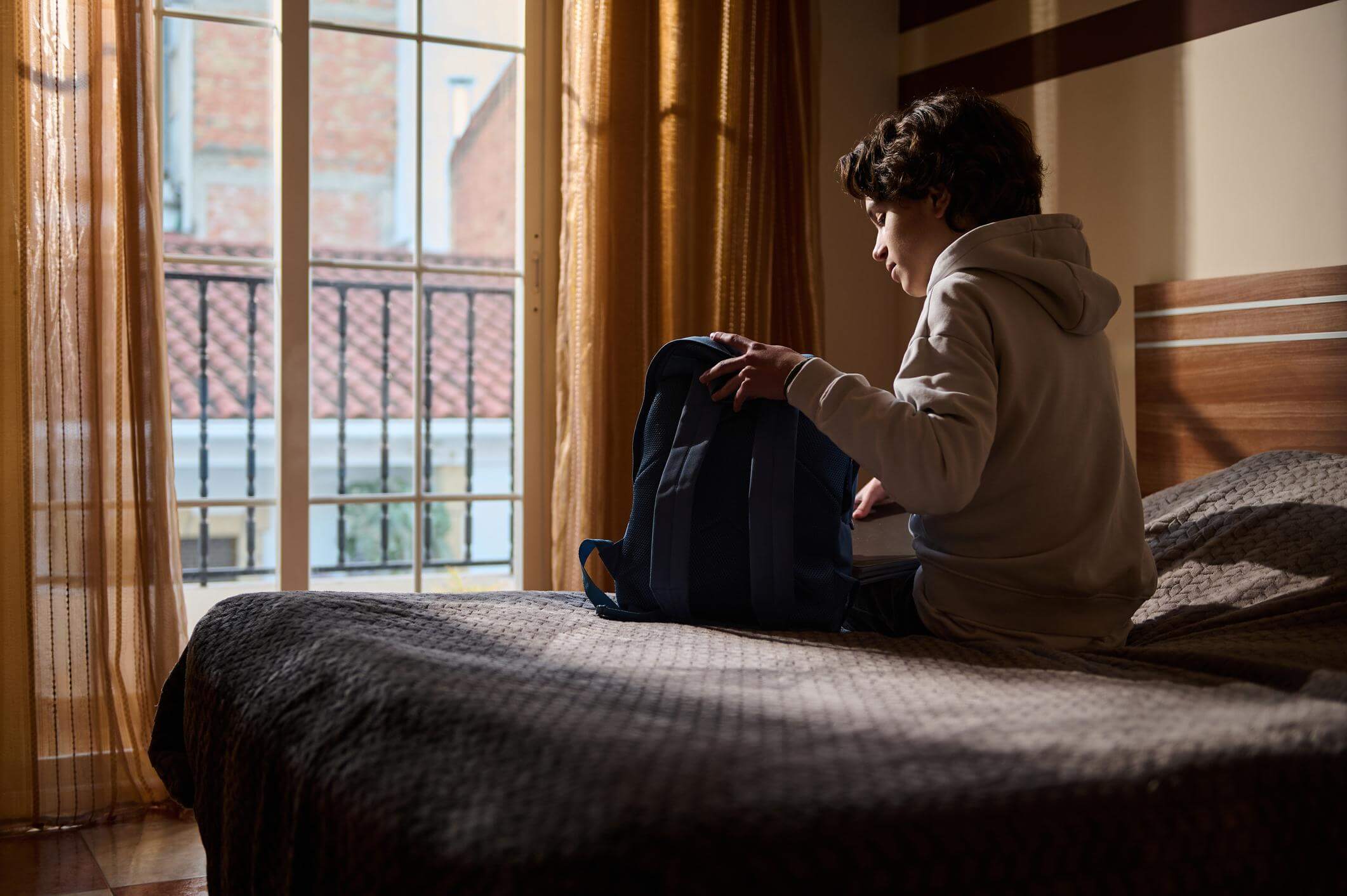 Student taking a quiet moment to manage anxiety before school